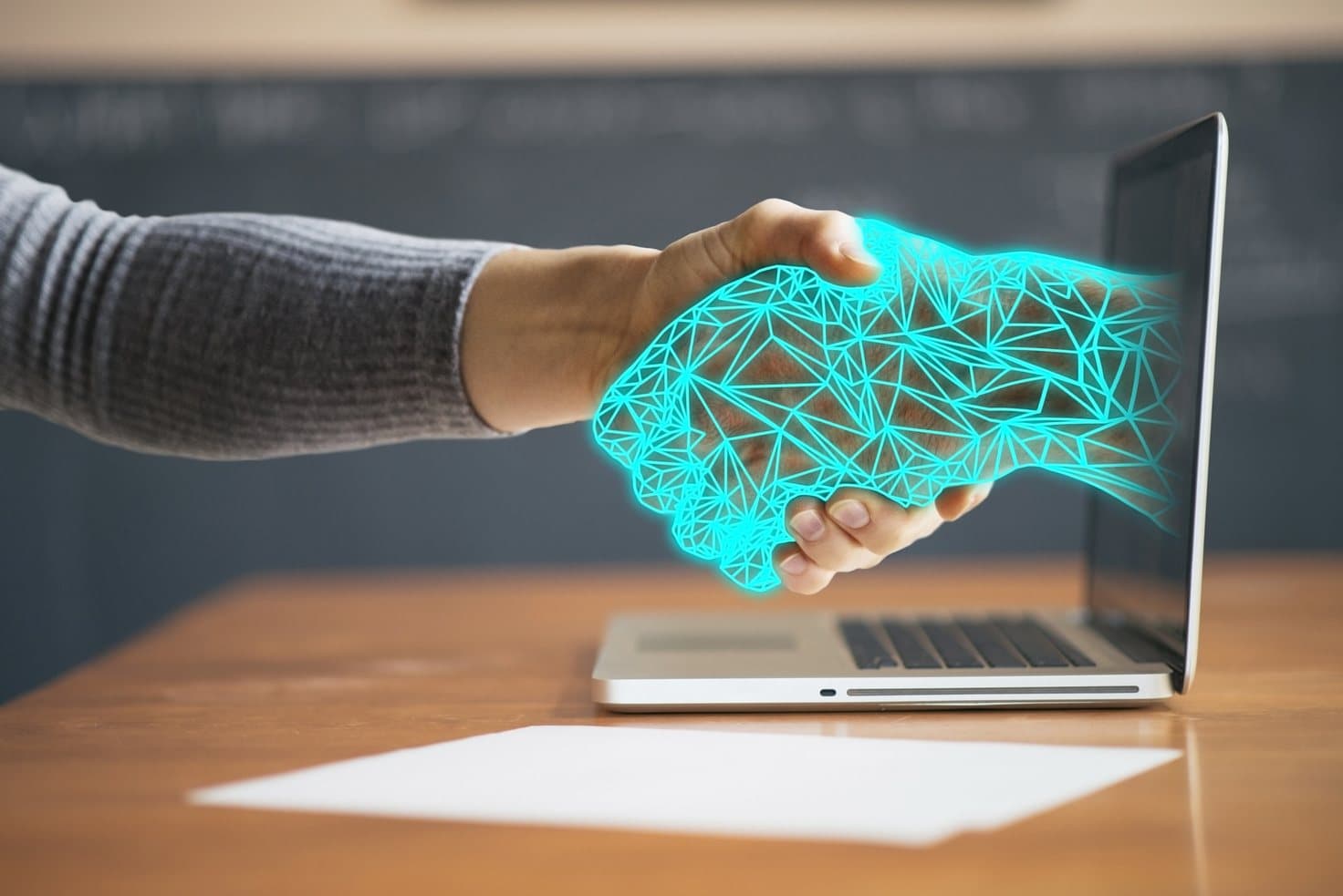 Passation numérique symbolisant la transition informatique